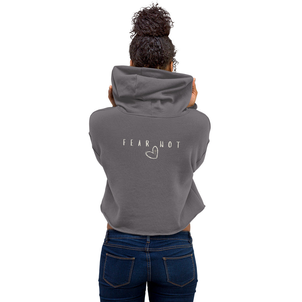 Woman wearing non-toxic faith-based crop hoodie